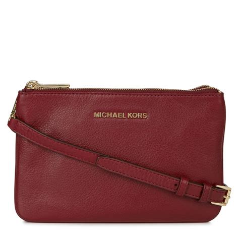 michael kors crossbody burgundy bag|Michael Kors triple compartment bag.